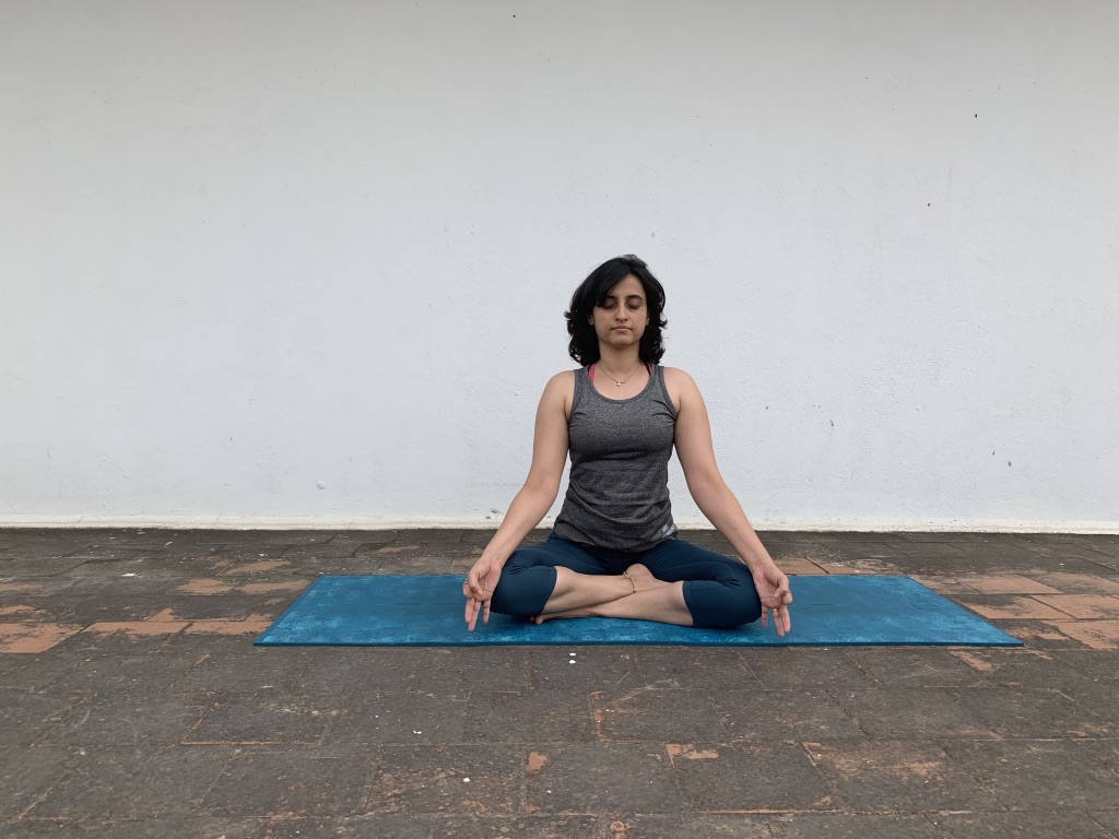 Shruthi in seated meditation — Chittamandara yoga classes